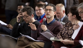 Khaled Keshk, associate professor and chair of Religious Studies, comments during a town hall meeting to discuss a draft of the university's strategic plan.  Photo by DePaul University's Jeff Carrion.